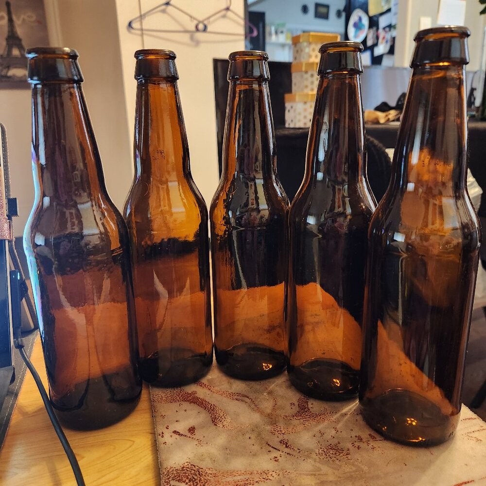 5 dark glass bottles